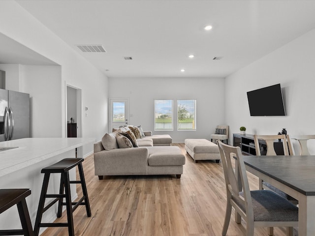 living room featuring light wood-type flooring