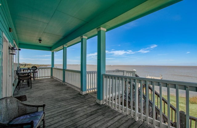 deck featuring a water view