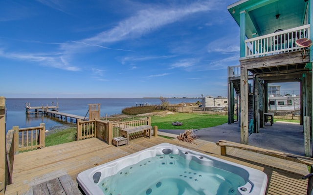 view of swimming pool featuring a deck with water view