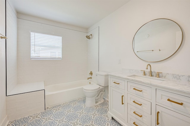 full bathroom with tiled shower / bath combo, vanity, tile patterned floors, and toilet