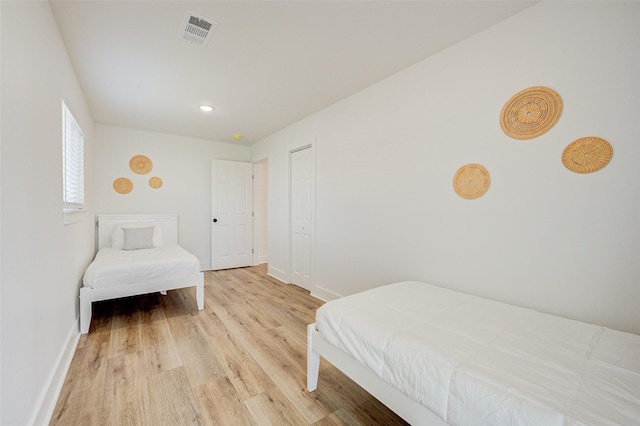 bedroom featuring light hardwood / wood-style flooring