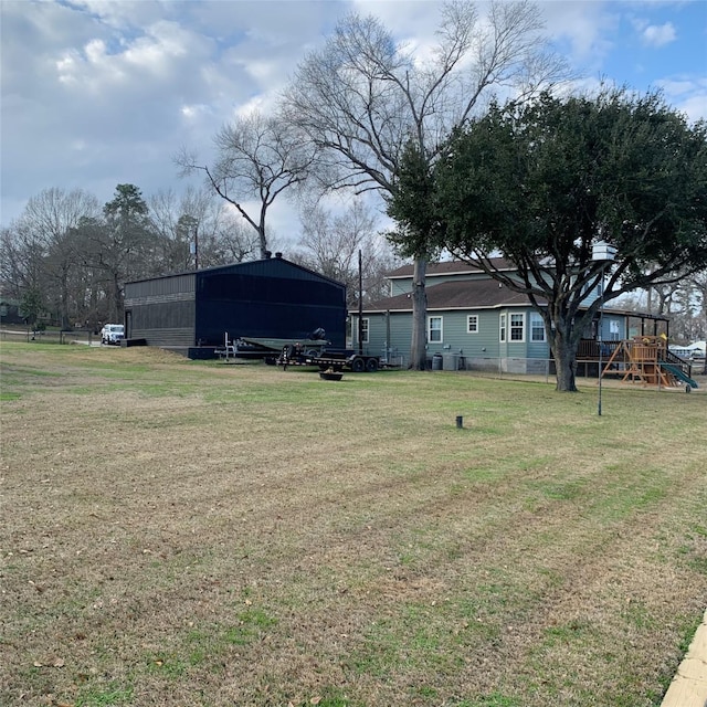 view of yard with a playground