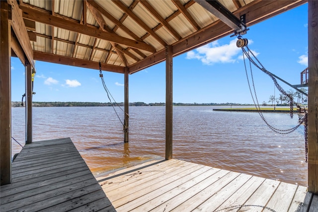 view of dock with a water view