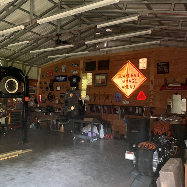 586 Beverly Blvd, Onalaska, TX 77360 - garage featuring a workshop area