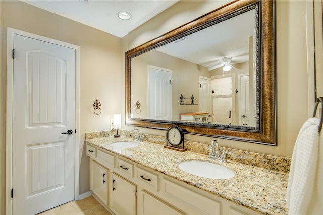 bathroom featuring ceiling fan, vanity, and tile patterned floors