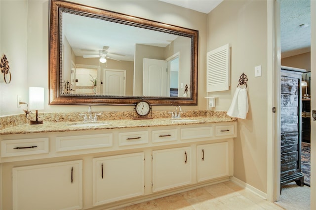 bathroom with vanity and ceiling fan