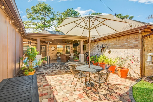 view of patio with ceiling fan