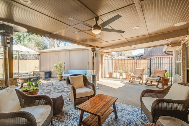 view of patio / terrace featuring an outdoor living space and ceiling fan