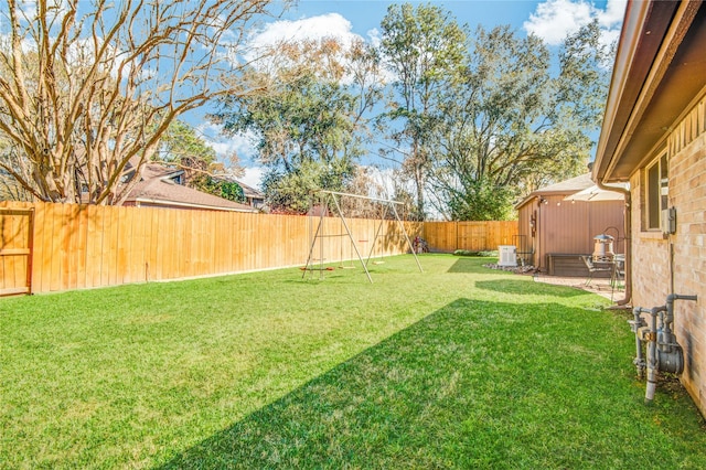 view of yard featuring central AC