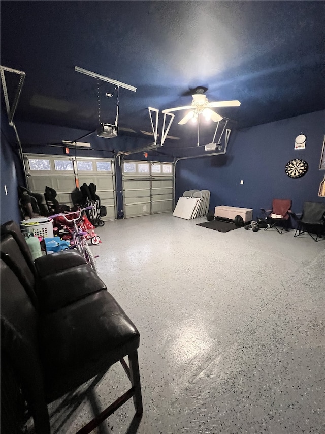 10722 Trail Ridge Dr, Houston, TX 77064 - garage featuring a garage door opener and a ceiling fan