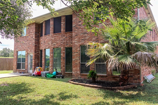 10722 Trail Ridge Dr, Houston, TX 77064 - view of front of property featuring brick siding and a patio area