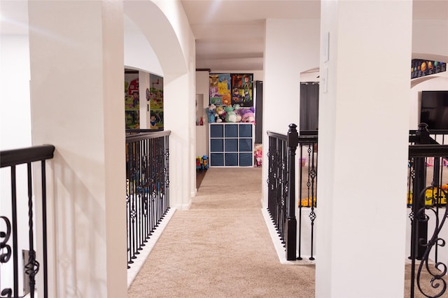 10722 Trail Ridge Dr, Houston, TX 77064 - hall with carpet and arched walkways