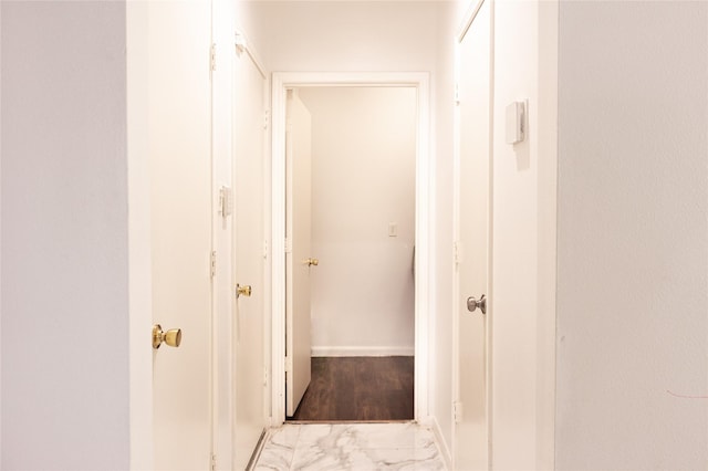 10722 Trail Ridge Dr, Houston, TX 77064 - hallway featuring marble finish flooring