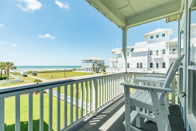 balcony featuring a water view