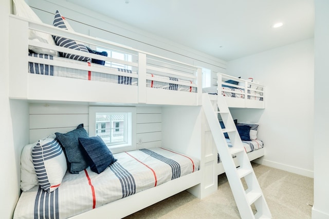 bedroom with light colored carpet