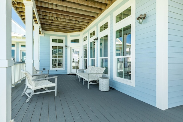 wooden terrace featuring a porch