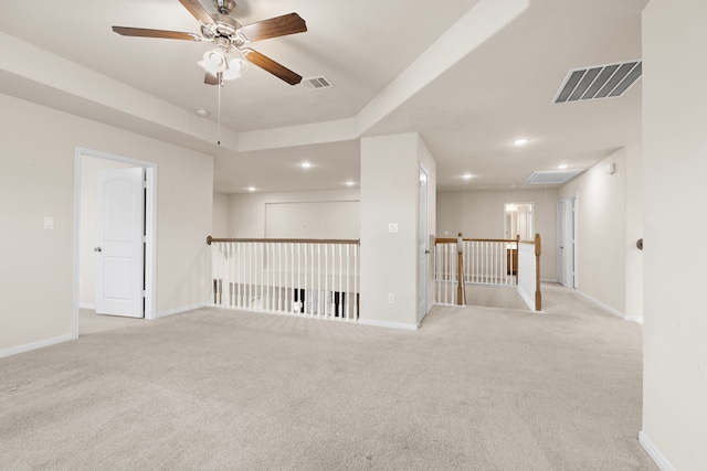 carpeted empty room with ceiling fan