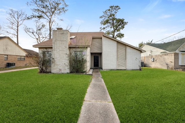 view of front of home with a front yard