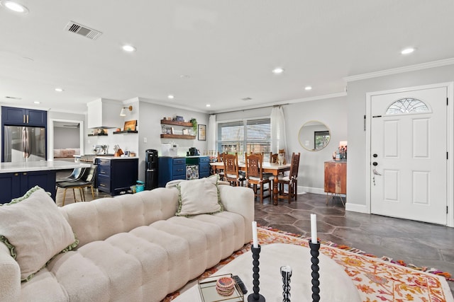 living room with ornamental molding