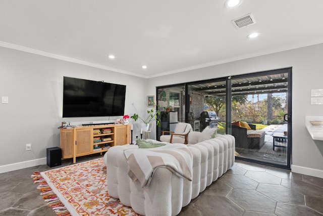 living room featuring crown molding