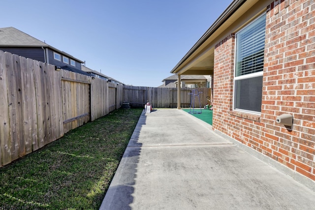 exterior space with a fenced backyard