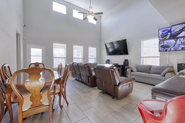 living area featuring a ceiling fan