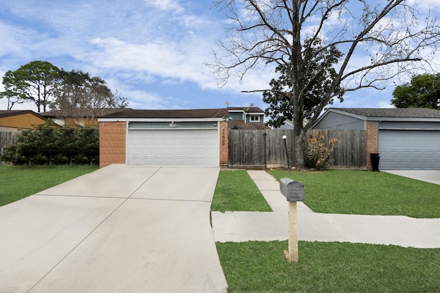 ranch-style home with a front lawn