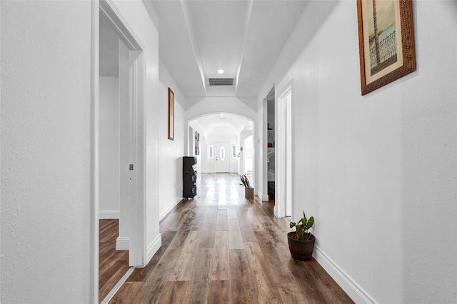 hall featuring wood-type flooring