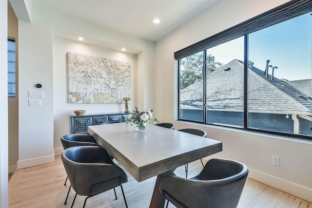 dining area with light wood-type flooring