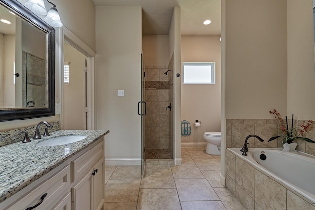 full bathroom with vanity, toilet, tile patterned flooring, and shower with separate bathtub