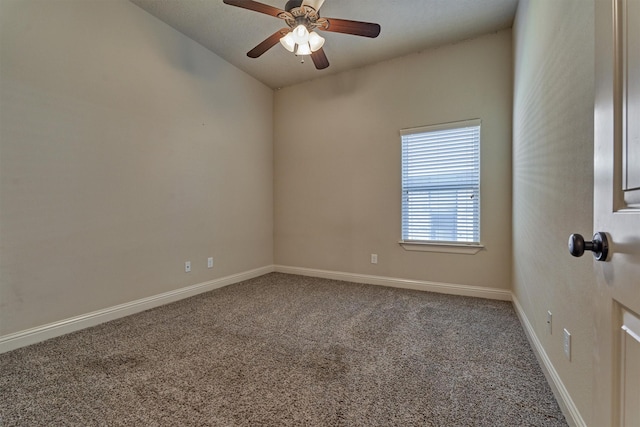 unfurnished room with vaulted ceiling, ceiling fan, and carpet floors