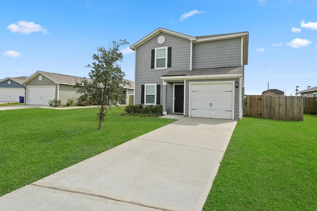 traditional-style home with driveway, a garage, and a front lawn