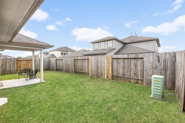 view of yard featuring a fenced backyard and a patio