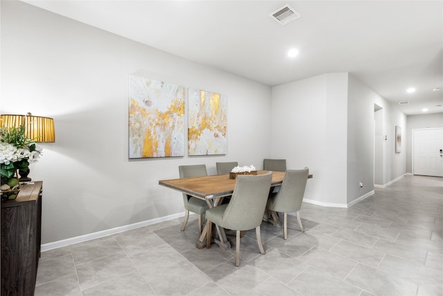 dining room with light tile patterned floors, recessed lighting, visible vents, and baseboards