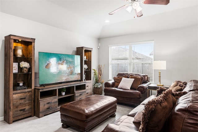 living room with lofted ceiling, light tile patterned floors, a ceiling fan, and recessed lighting