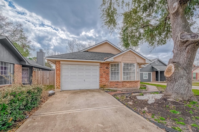 ranch-style house featuring a garage