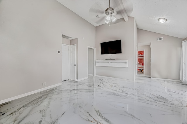 unfurnished living room with a ceiling fan, visible vents, a textured ceiling, and baseboards