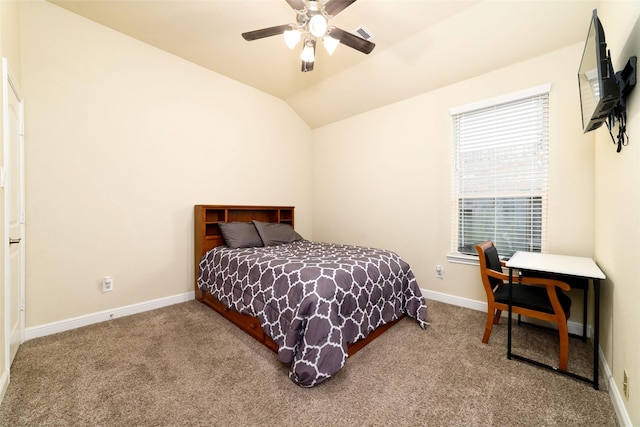 bedroom featuring vaulted ceiling, carpet, and ceiling fan