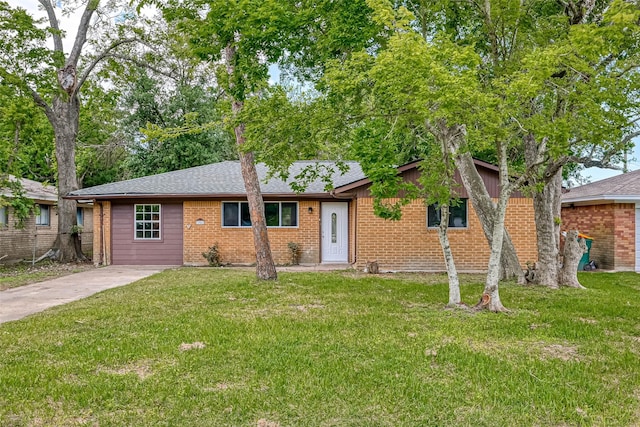 ranch-style house with a front lawn