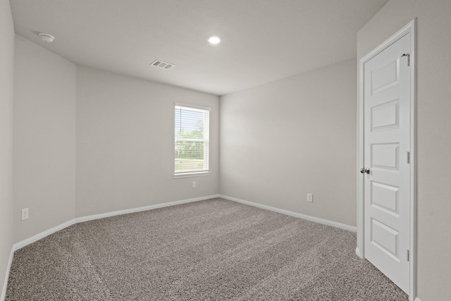 2331 E Chunk Dr, Conroe, TX 77301 - carpeted spare room with visible vents and baseboards