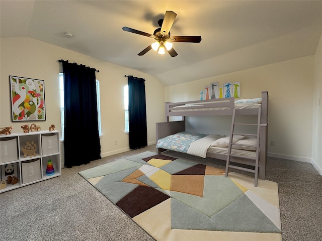 carpeted bedroom with lofted ceiling and ceiling fan