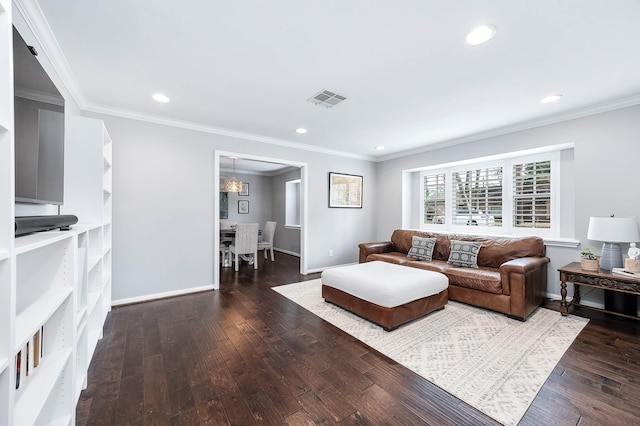 living room featuring ornamental molding and dark hardwood / wood-style floors