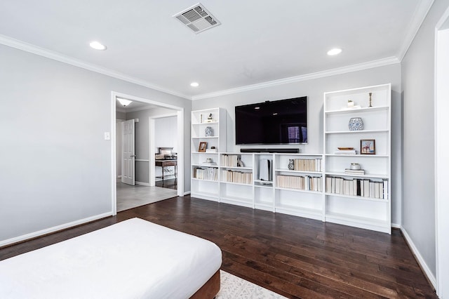 bedroom featuring hardwood / wood-style floors and crown molding