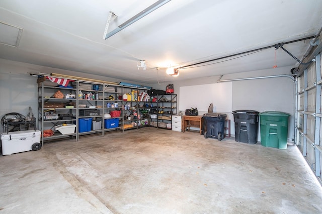 garage featuring a garage door opener