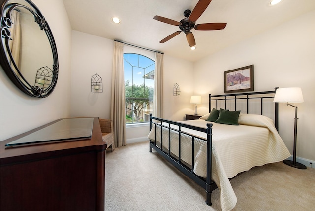 carpeted bedroom with ceiling fan