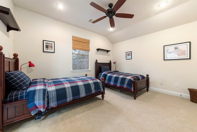 bedroom featuring lofted ceiling, light carpet, and ceiling fan