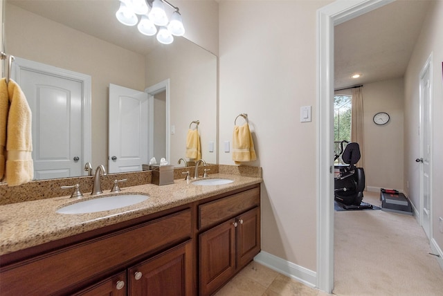 bathroom featuring tile patterned floors and vanity