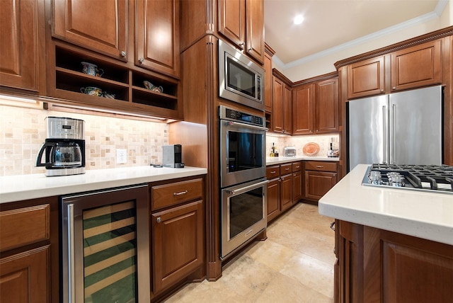 kitchen with crown molding, appliances with stainless steel finishes, beverage cooler, and backsplash