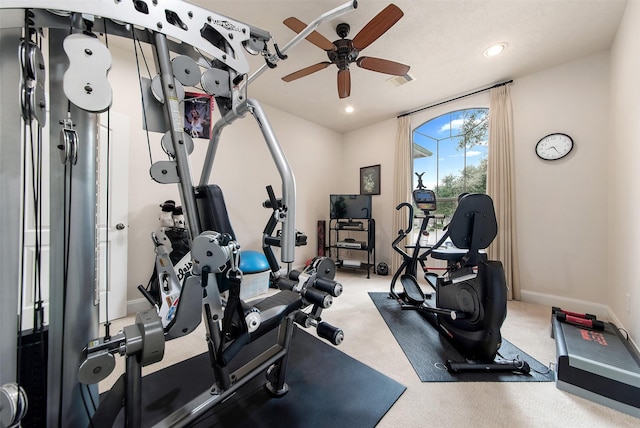 exercise room featuring ceiling fan