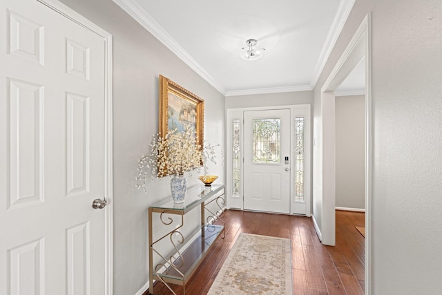 entrance foyer with crown molding and dark wood-type flooring